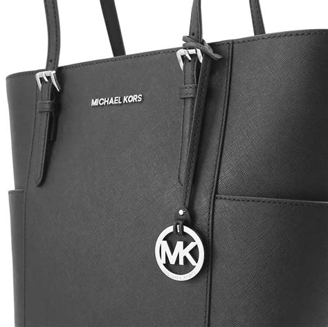 michael kors jet set side pockets|michael kors jet set airplane.